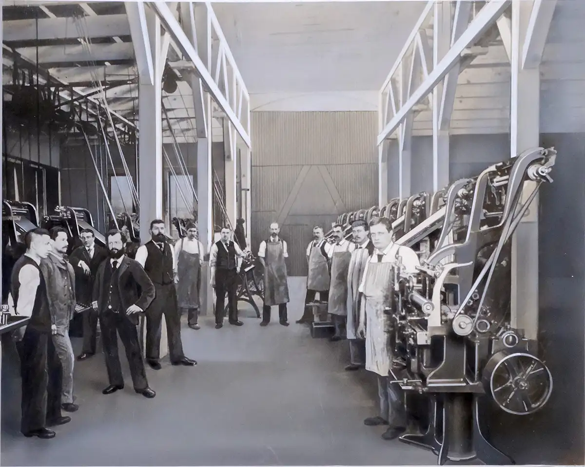 Ottmar Mergenthaler in his Baltimore, MD factory surrounded by his employees